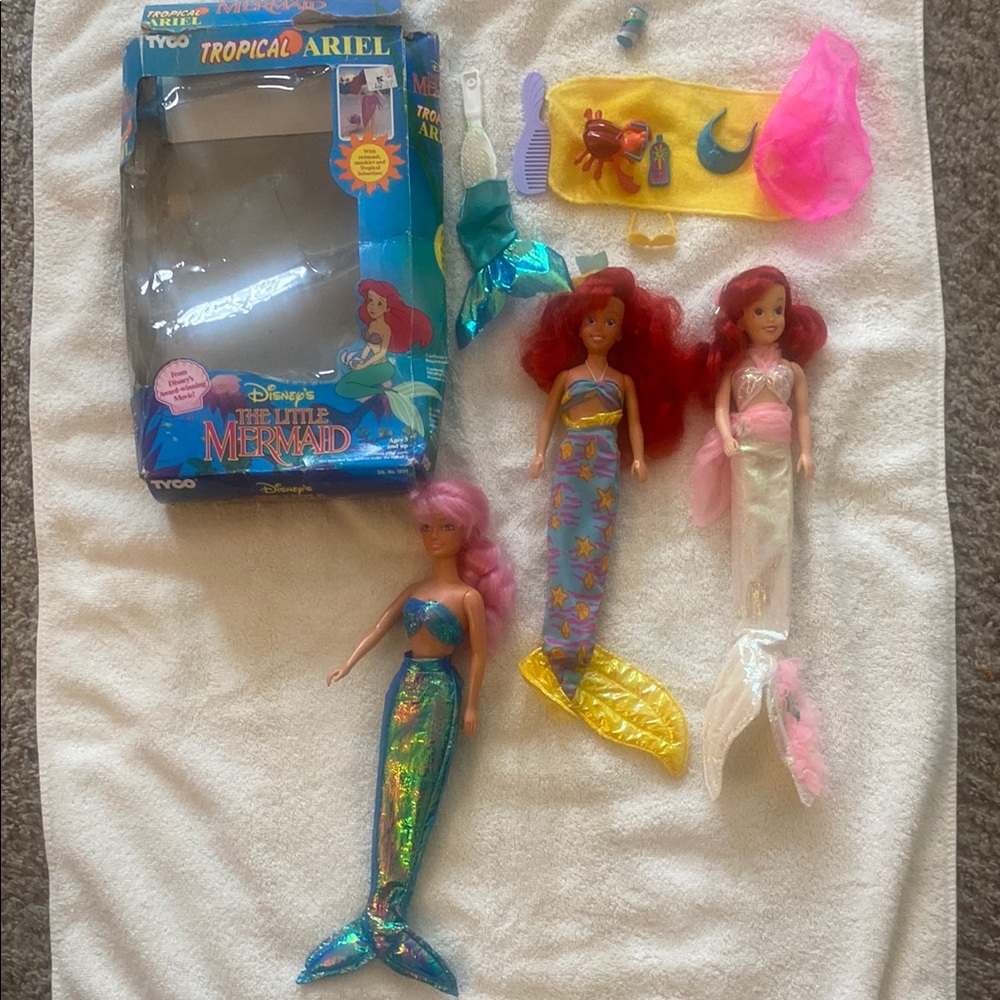 Tropical Aeriel, Undersea party Aeriel, and Barbie mermaid and accessories.